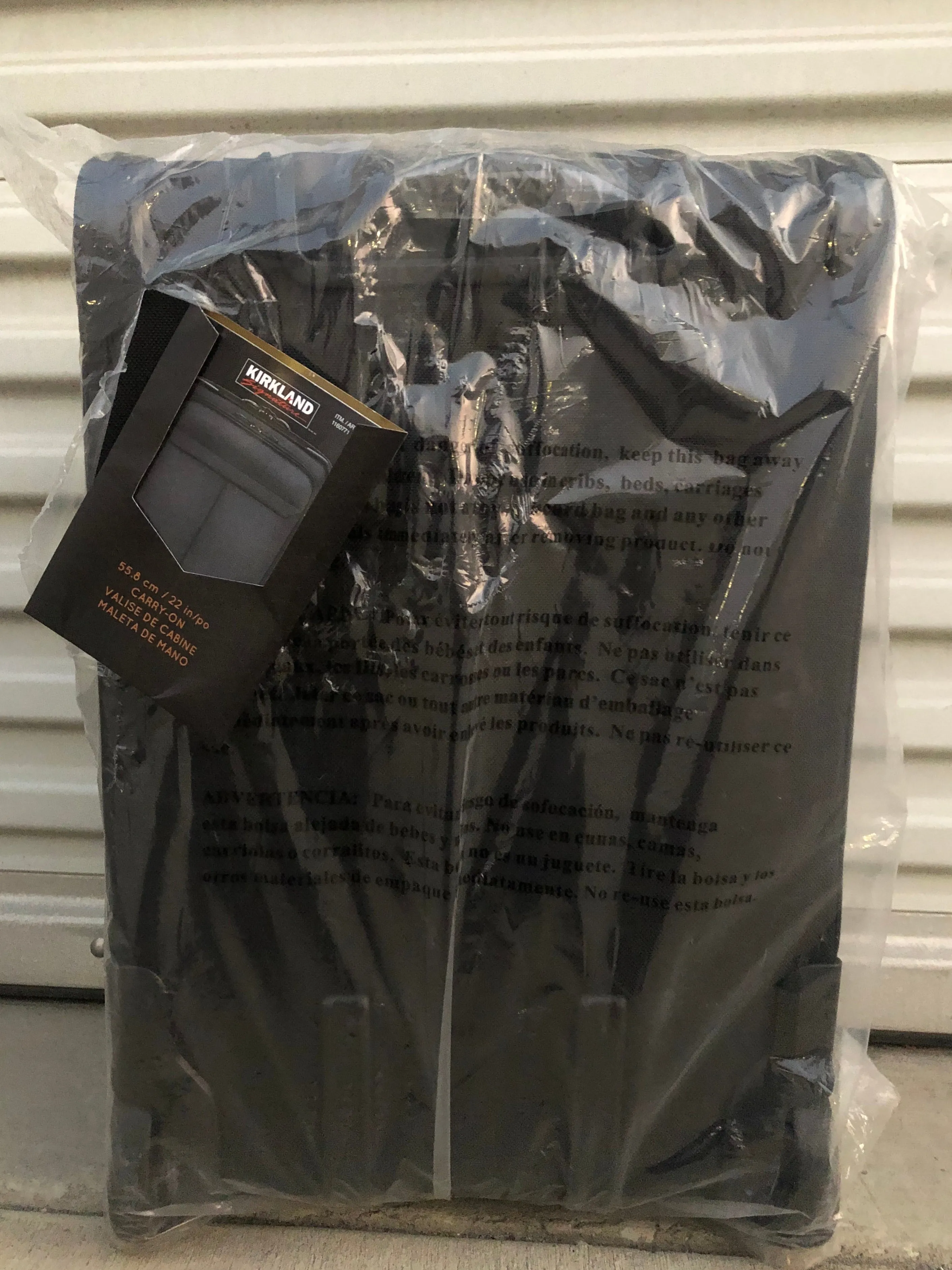 New Kirkland 22 in carry-on black  suitcase