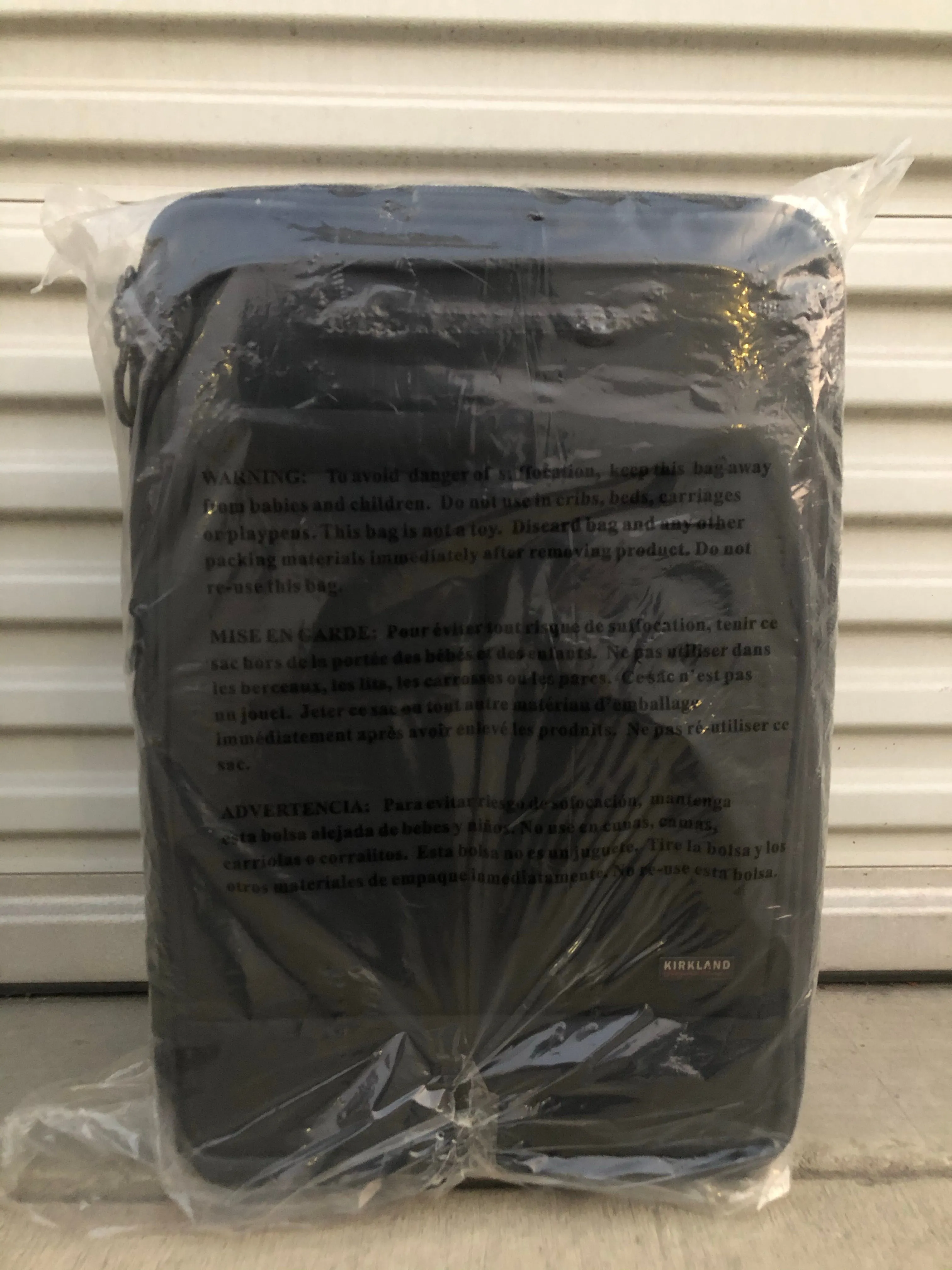 New Kirkland 22 in carry-on black  suitcase